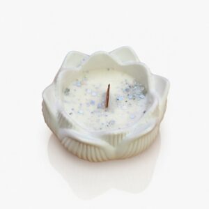 Candle in white ceramic